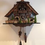 Quartz Cuckoo Clock Black Forest House with Moving Train, with Music EN 48110 QMT